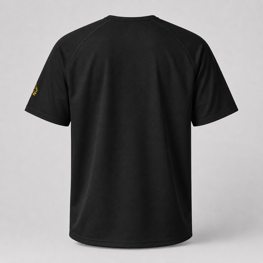 Black short-sleeve athletic t-shirt shown from the back, featuring a small yellow embroidered logo on the left sleeve, set against a neutral light gray background.