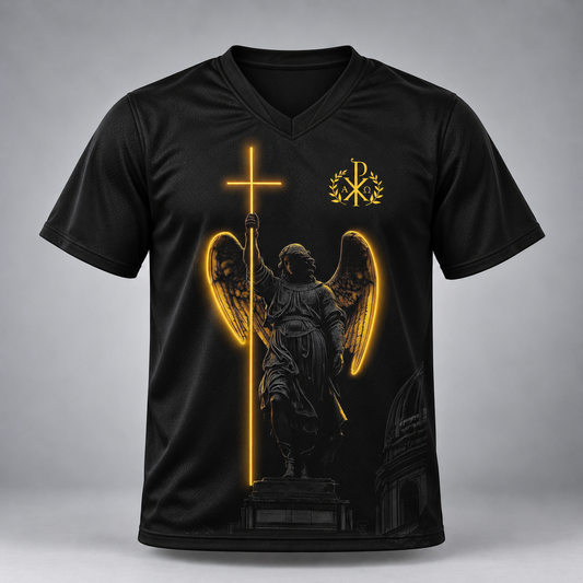A black short-sleeve V-neck t-shirt with a graphic print of an angel statue holding a glowing golden cross, with a gold monogram logo on the upper chest, shown against a gray gradient background.