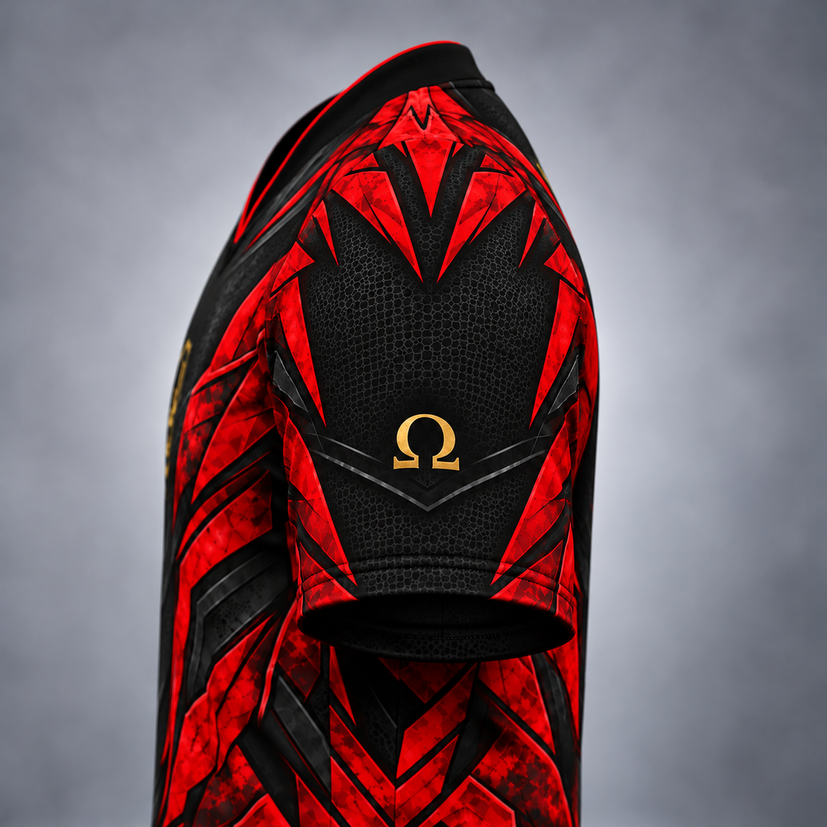 Close-up of a red and black patterned athletic jersey with a gold Omega logo on the sleeve, shown against a soft gray studio background.