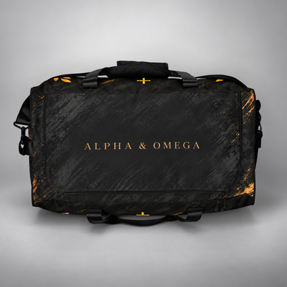 A black duffel bag with gold foil lettering reading 'ALPHA & OMEGA' on the front, set against a neutral gray background.