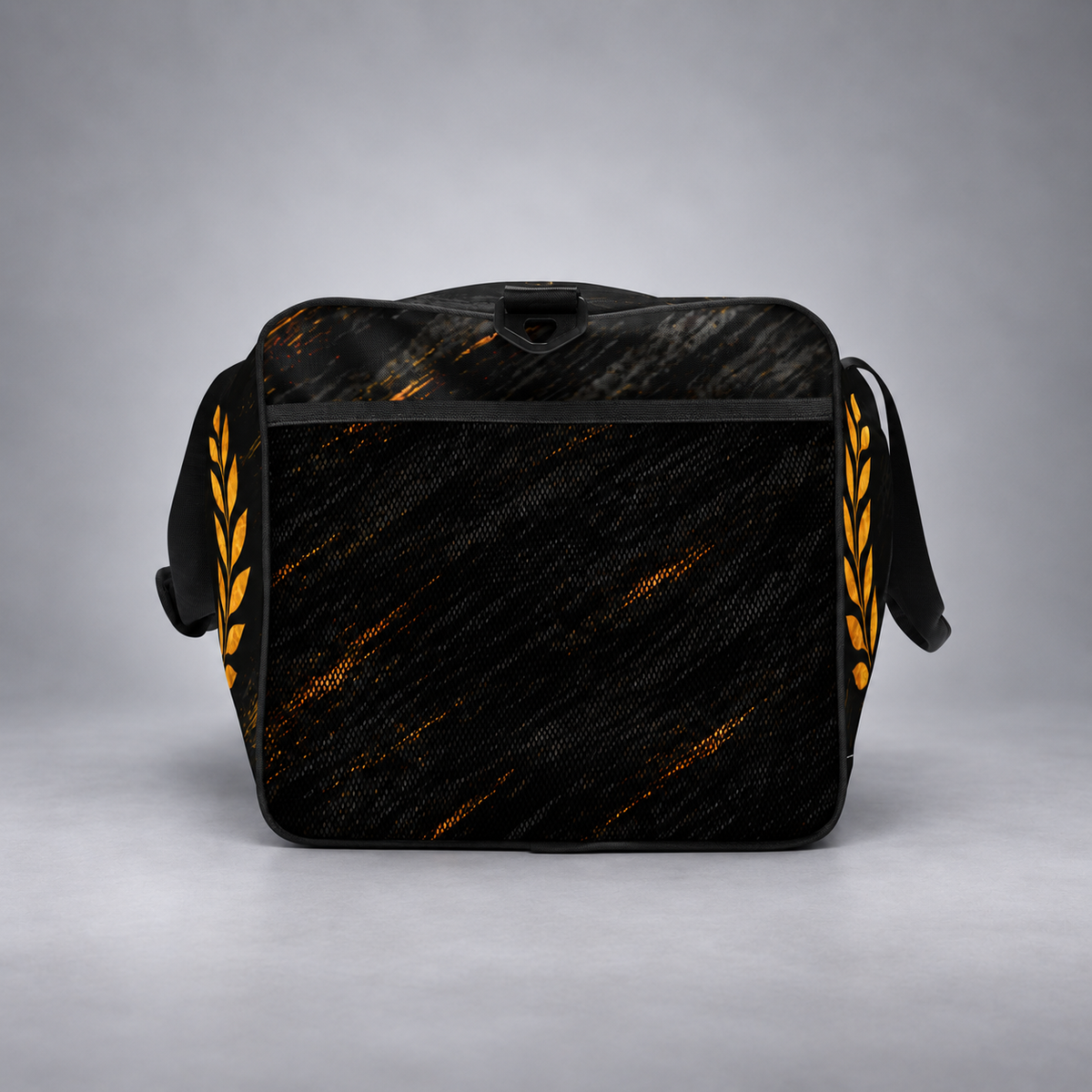 A black messenger bag with a textured, woven-like pattern and bright orange-gold streaks, featuring a black shoulder strap with gold laurel leaf details on both sides, set against a neutral gray studio background.