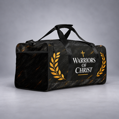 A black duffel bag with a subtle textured pattern, featuring the text 'WARRIORS OF CHRIST' in white with a gold cross, flanked by gold laurel wreaths. The bag is shown on a neutral gray studio background.