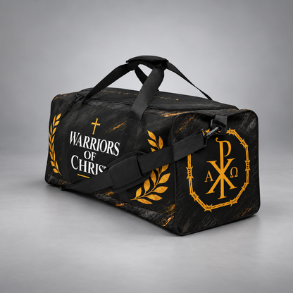 A black duffel bag with gold and white graphics, featuring the text 'WARRIORS OF CHRIST' with a cross and laurel leaves on one side, and a Chi-Rho monogram inside a barbed-wire circle on the other.