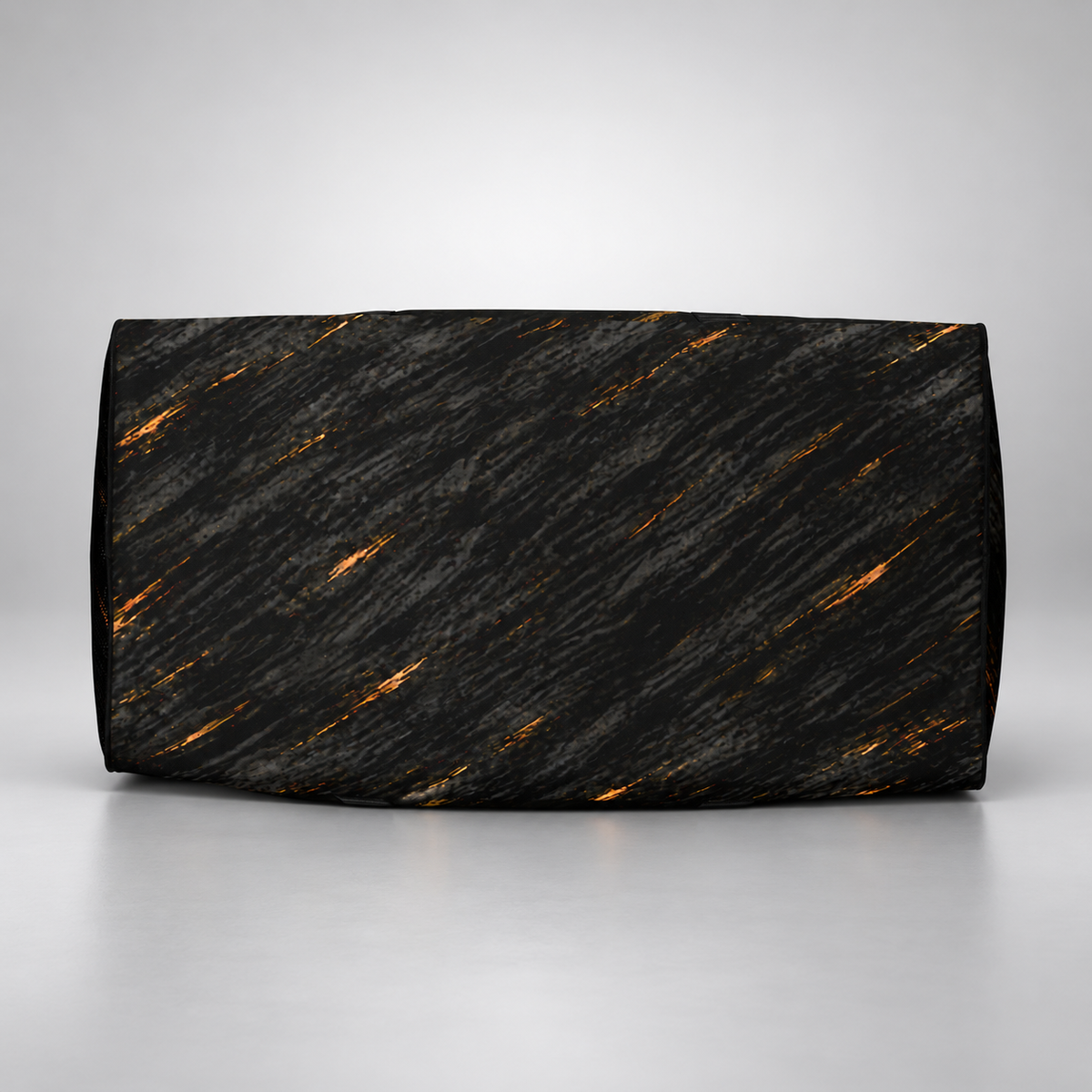 A black clutch bag with a textured, brushstroke-like pattern accented by diagonal metallic gold streaks, shown on a neutral gray background.