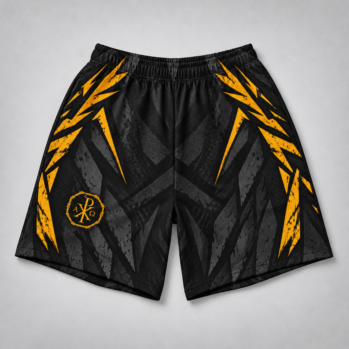 Black athletic shorts with a distressed geometric pattern and bright yellow lightning-bolt graphics on the sides, featuring a circular yellow logo on the left leg, shown against a neutral gray background.
