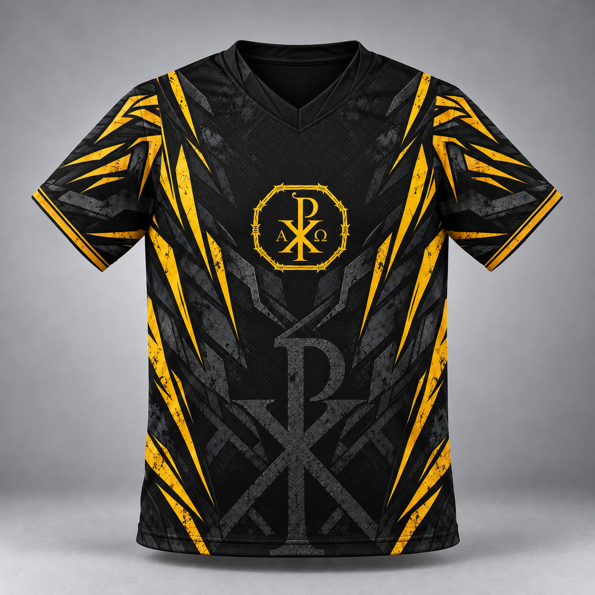 A black short-sleeve V-neck jersey with a distressed gray graphic pattern and bold yellow accents, featuring a circular Chi Rho monogram with Greek letters on the chest.