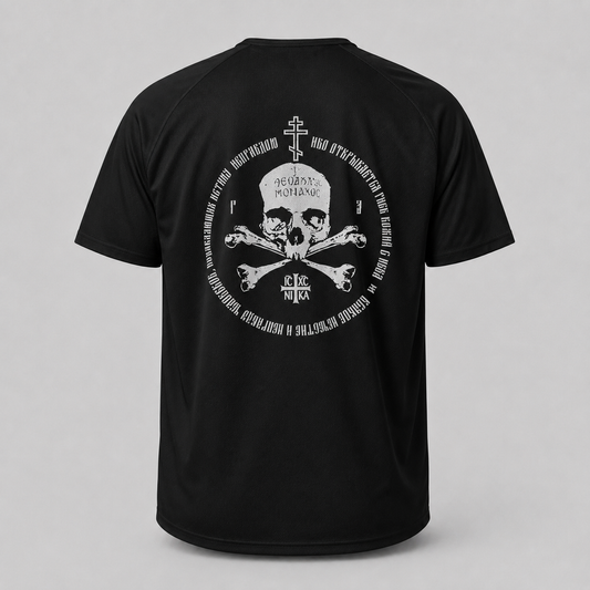 A black short-sleeve t-shirt shown from the back, featuring a large white graphic print of a skull and crossbones 